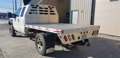 SCOTT/ TAFCO MAGNUM CONTRACTOR BODY, 9' TO 18' LENGTHS, 96" WIDE, WITH 14" FOLDING SIDES, CAB PROTECTOR AND LIGHTS, Give us a call today to quote and build this <b>truck</b> today! 2024 Henderson 18 FT. . Truck bed for sale near me